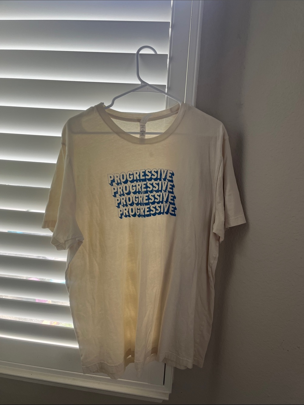 Men's Cream Graphic Tee with Blue 'Progressive' Print